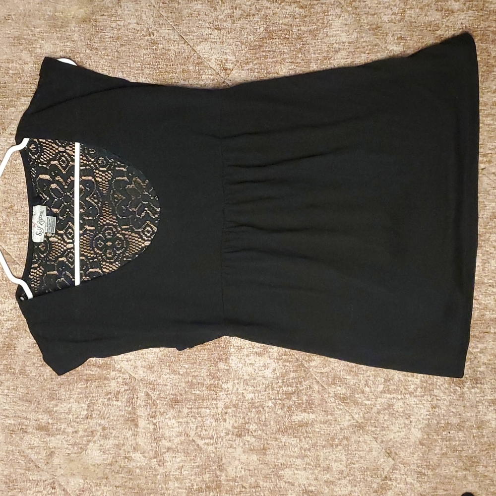 Black short sleeve top by Self Esteem. Medium